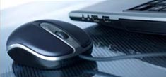 Contact us photo of mouse and laptop